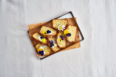Lemon Drizzle with Mascarpone, Pistachios & Edible Flowers